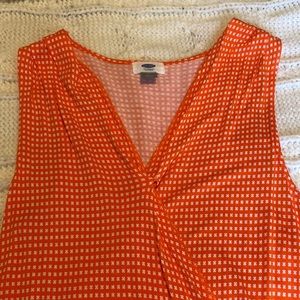 Orange sleeveless top